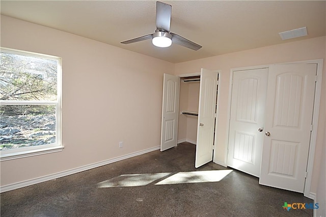 unfurnished bedroom featuring ceiling fan