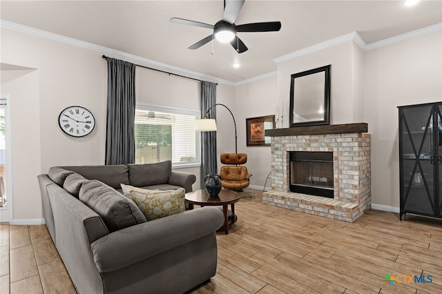 2727 Torino Reale Ave, Temple, TX 76502 - living area with crown molding, baseboards, and light wood-style floors