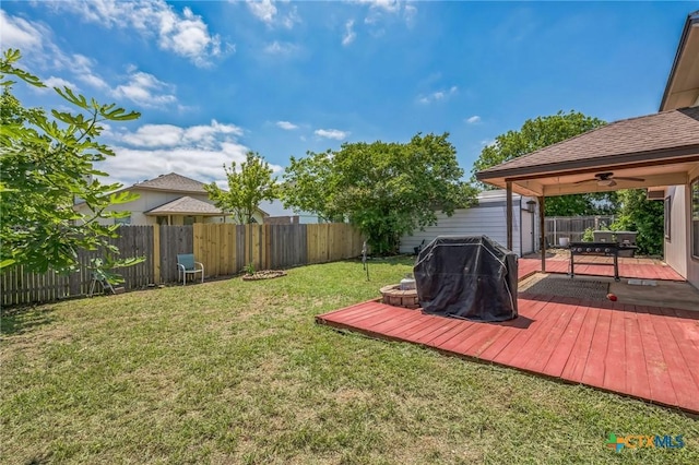 7123 Kevin Dr, Temple, TX 76502 - view of yard with a wooden deck, an outbuilding, and ceiling fan