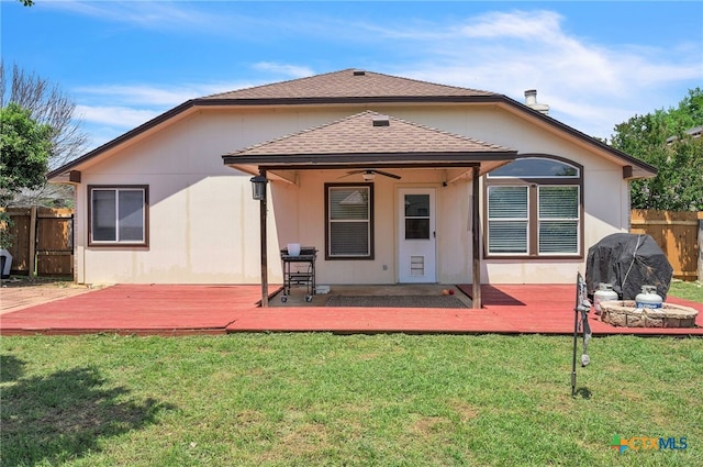 7123 Kevin Dr, Temple, TX 76502 - back of property featuring ceiling fan, roof with shingles, and a deck