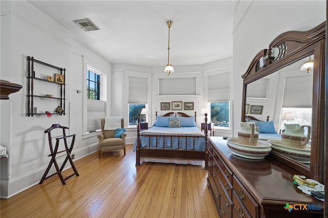 bedroom with light hardwood / wood-style flooring