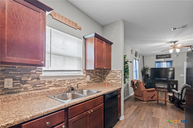 2709 Odem St, Victoria, TX 77901 - kitchen featuring black dishwasher, light wood-style flooring, healthy amount of natural light, and ceiling fan