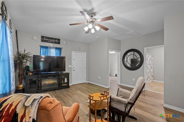 2709 Odem St, Victoria, TX 77901 - living room with wood finished floors and ceiling fan