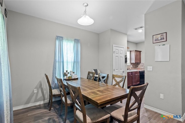 2709 Odem St, Victoria, TX 77901 - dining room featuring baseboards and wood finished floors