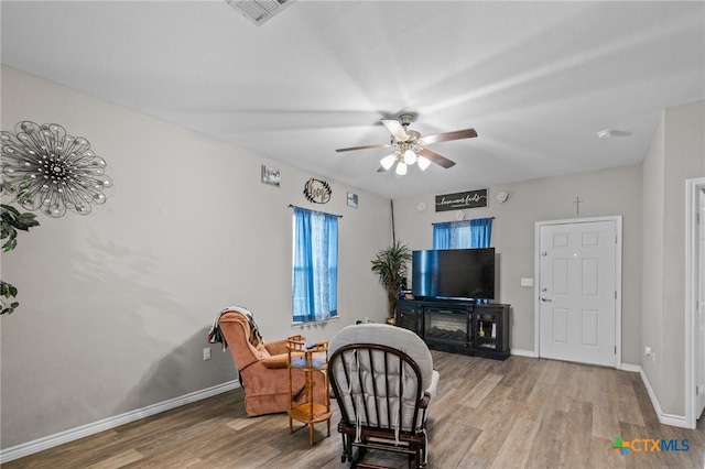 2709 Odem St, Victoria, TX 77901 - living area featuring wood finished floors and ceiling fan