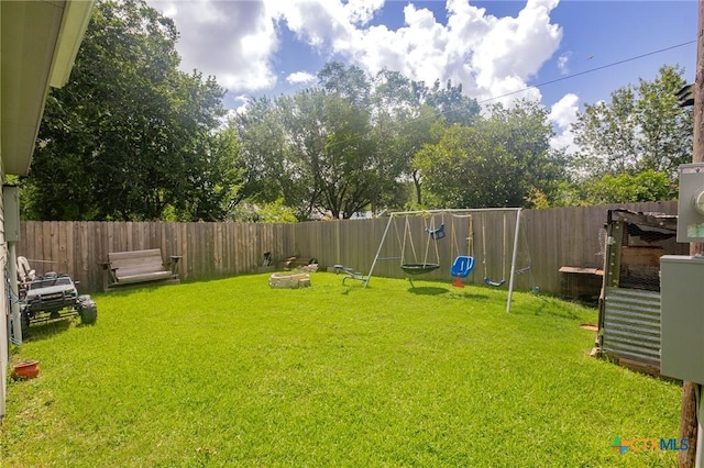 2709 Odem St, Victoria, TX 77901 - fenced backyard with a playground