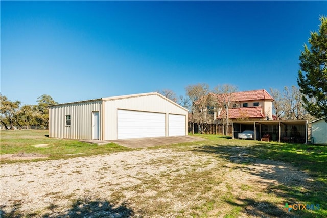 garage with a carport