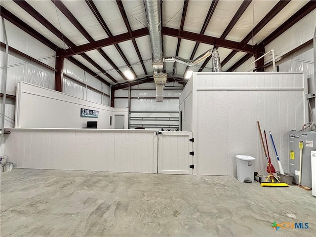 garage featuring water heater