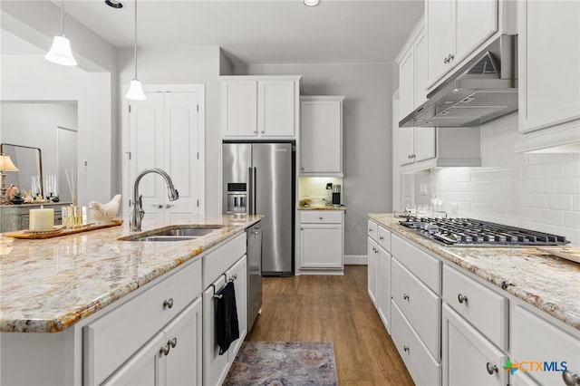 kitchen featuring stainless steel appliances, dark hardwood / wood-style floors, white cabinetry, and sink