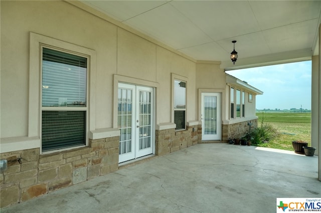 view of patio / terrace featuring french doors