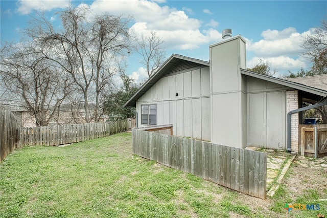 view of home's exterior featuring a yard