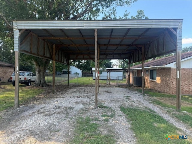 view of parking with a carport