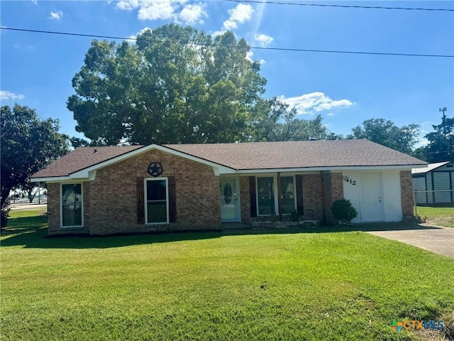 ranch-style house with a front lawn