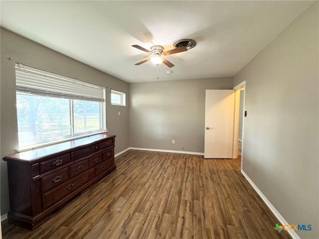 interior space with ceiling fan and hardwood / wood-style floors