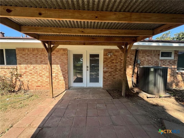 view of patio featuring central air condition unit and french doors