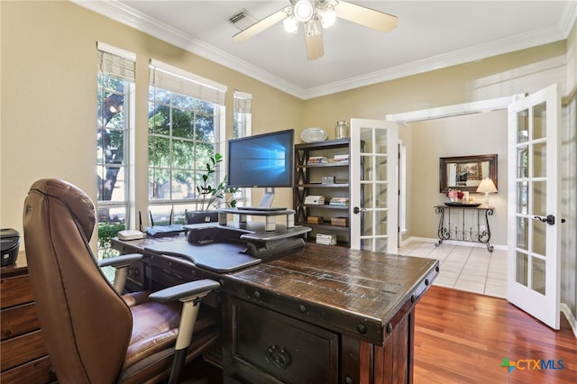 office space with ornamental molding, french doors, and ceiling fan