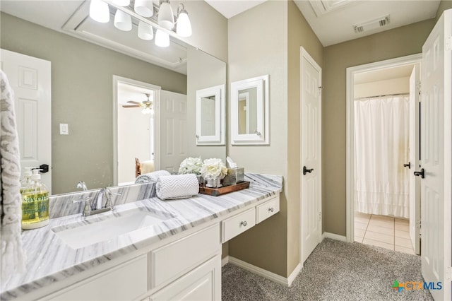 bathroom with vanity and tile patterned flooring