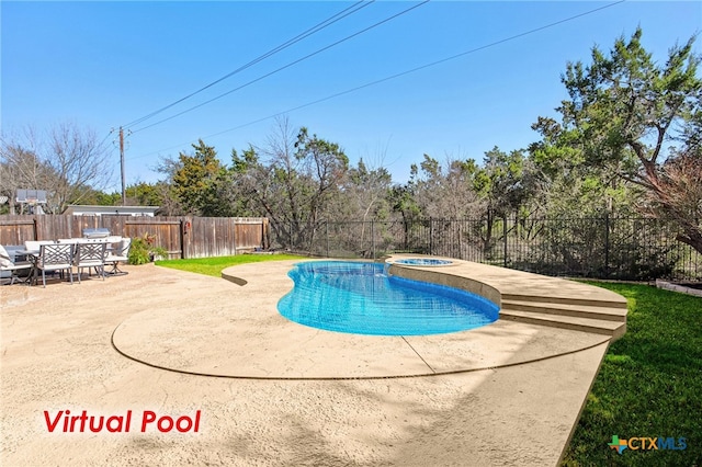 view of swimming pool with an in ground hot tub and a patio area