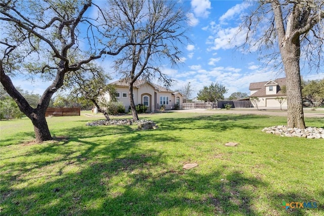 view of yard with fence