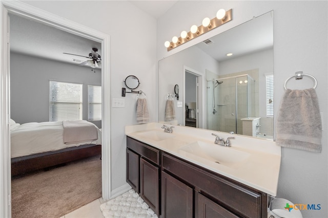 bathroom featuring ensuite bath, double vanity, a stall shower, and a sink