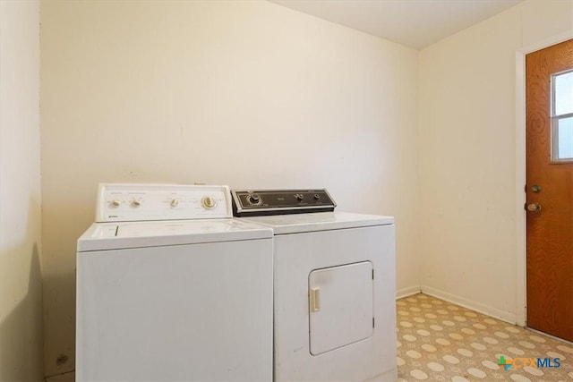 302 W Upshaw Ave, Temple, TX 76501 - washroom with washer and clothes dryer, light flooring, and baseboards