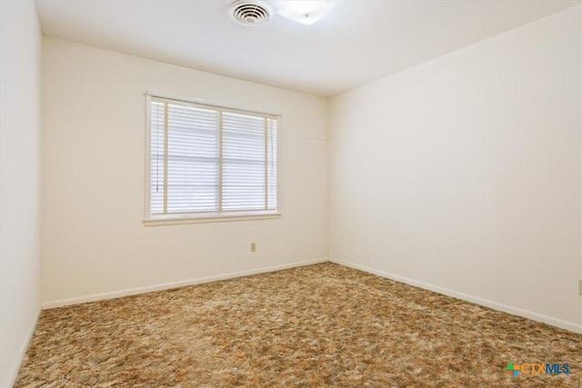 302 W Upshaw Ave, Temple, TX 76501 - spare room with carpet floors and baseboards
