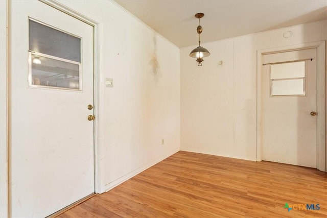 302 W Upshaw Ave, Temple, TX 76501 - unfurnished dining area with light wood-style flooring
