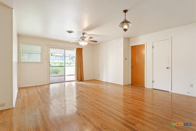 302 W Upshaw Ave, Temple, TX 76501 - spare room featuring light wood finished floors and ceiling fan