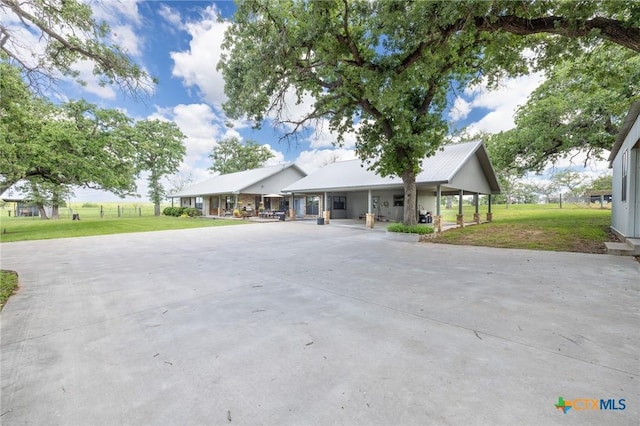 6589 State Highway 304, Harwood, TX 78632 - view of front of house with a front yard and a porch