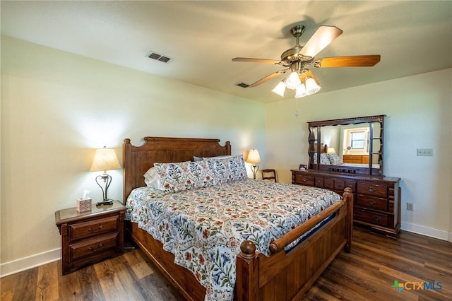 6589 State Highway 304, Harwood, TX 78632 - bedroom featuring baseboards, dark wood-type flooring, and ceiling fan
