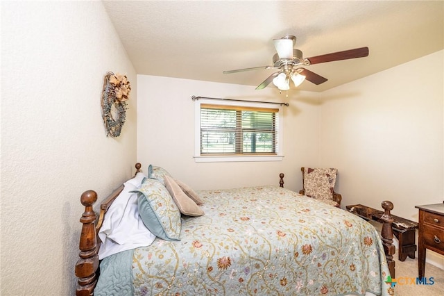 6589 State Highway 304, Harwood, TX 78632 - bedroom with carpet floors and a ceiling fan