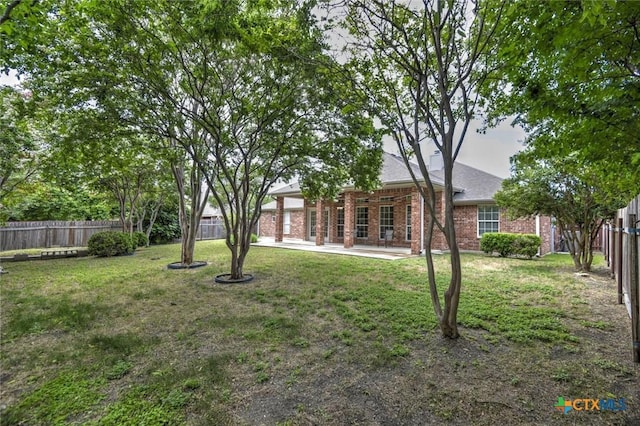 2109 Southport Dr, Killeen, TX 76542 - fenced backyard featuring a patio