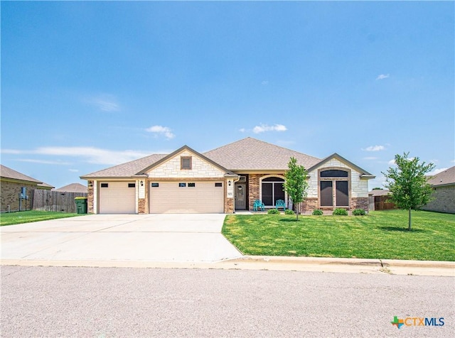 503 Willow Dr, Troy, TX 76579 - ranch-style house featuring a garage, brick siding, driveway, and a shingled roof