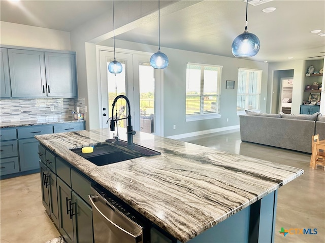 kitchen with sink, light stone countertops, an island with sink, stainless steel dishwasher, and decorative backsplash