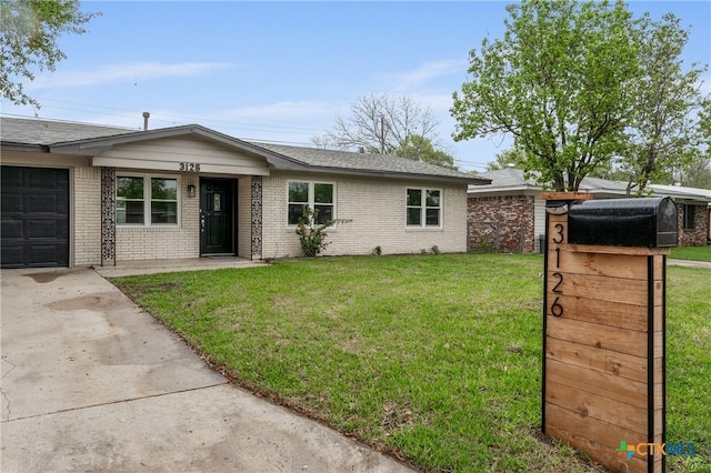 3126 Glenwood Dr, Temple, TX 76502 - ranch-style home with driveway, a front yard, a garage, and brick siding