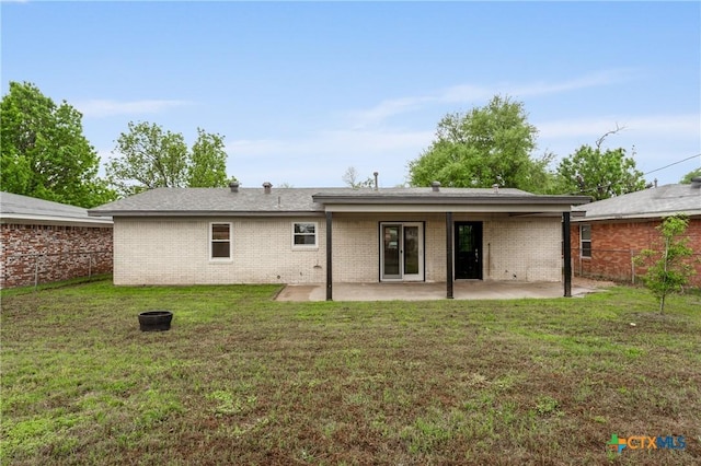 3126 Glenwood Dr, Temple, TX 76502 - back of house featuring a patio, brick siding, a yard, and fence