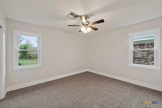 3126 Glenwood Dr, Temple, TX 76502 - unfurnished room featuring visible vents, a wealth of natural light, ceiling fan, and baseboards