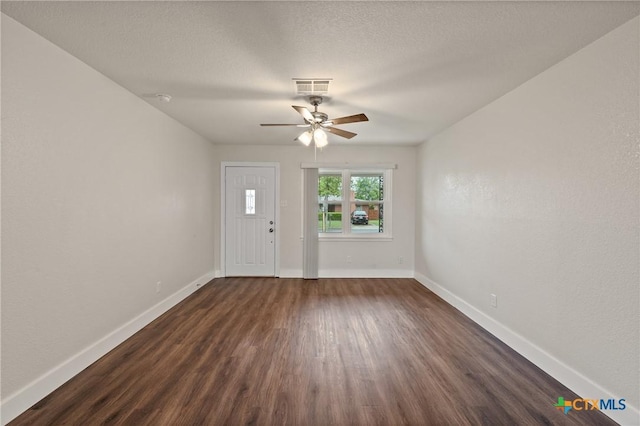3126 Glenwood Dr, Temple, TX 76502 - interior space featuring visible vents, dark wood-style flooring, baseboards, and ceiling fan