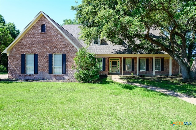 view of front of home with a front yard