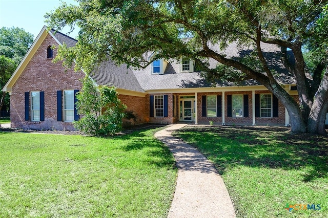 view of front of house with a front lawn