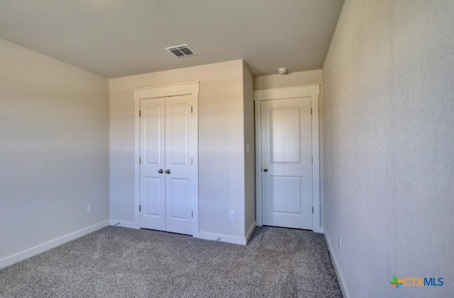 911 Cloud Sky Rd, New Braunfels, TX 78130 - unfurnished bedroom with carpet floors and a closet