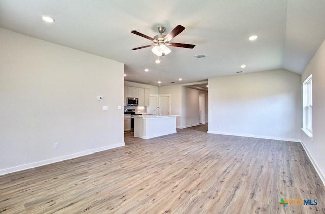 911 Cloud Sky Rd, New Braunfels, TX 78130 - unfurnished living room featuring ceiling fan, light wood finished floors, and recessed lighting