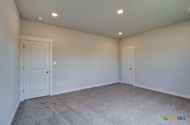 911 Cloud Sky Rd, New Braunfels, TX 78130 - carpeted empty room featuring recessed lighting and a smoke detector