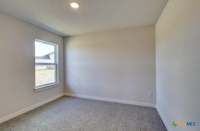 911 Cloud Sky Rd, New Braunfels, TX 78130 - empty room with carpet floors and baseboards