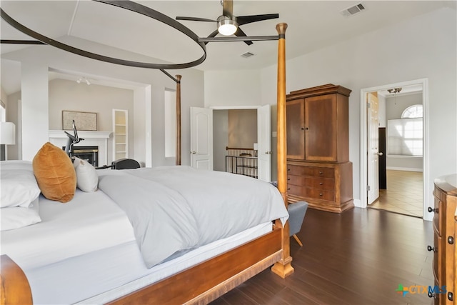 3836 Newland Ct, Round Rock, TX 78681 - bedroom with dark wood-type flooring and a ceiling fan
