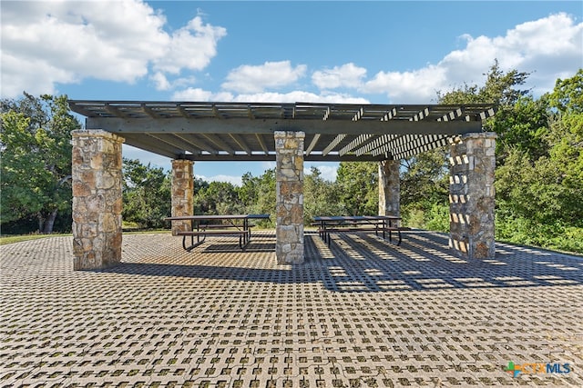 view of property's community with a pergola