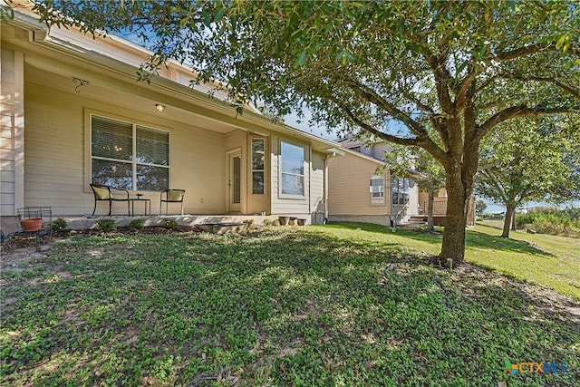 exterior space with a yard