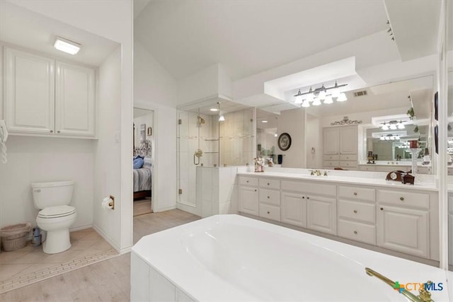 2113 Highland Dr, Salado, TX 76571 - full bathroom with a stall shower, vanity, a bathtub, toilet, and connected bathroom