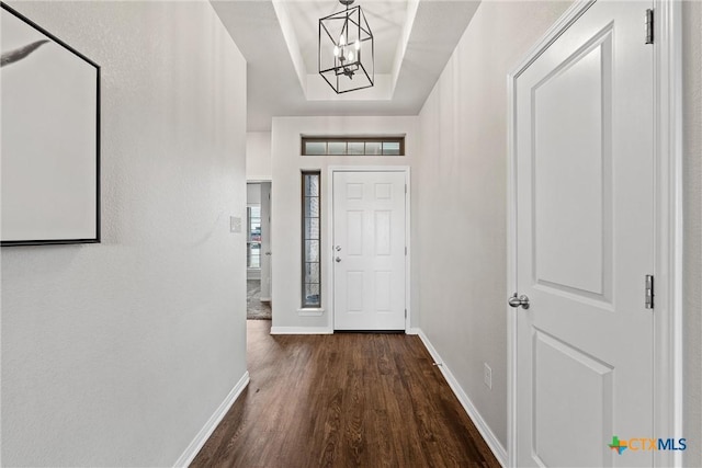 1332 Lakeway Crossing Dr, Temple, TX 76502 - foyer featuring baseboards, dark wood-style flooring, and a chandelier
