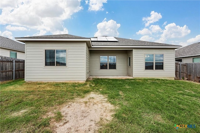 1332 Lakeway Crossing Dr, Temple, TX 76502 - back of property with roof mounted solar panels and a patio area